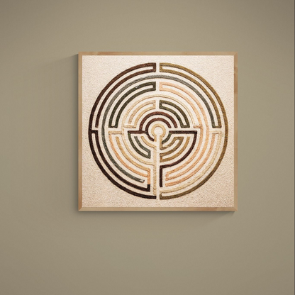 Square earth-tone concentric labyrinth poster on textured beige background in a light wood frame