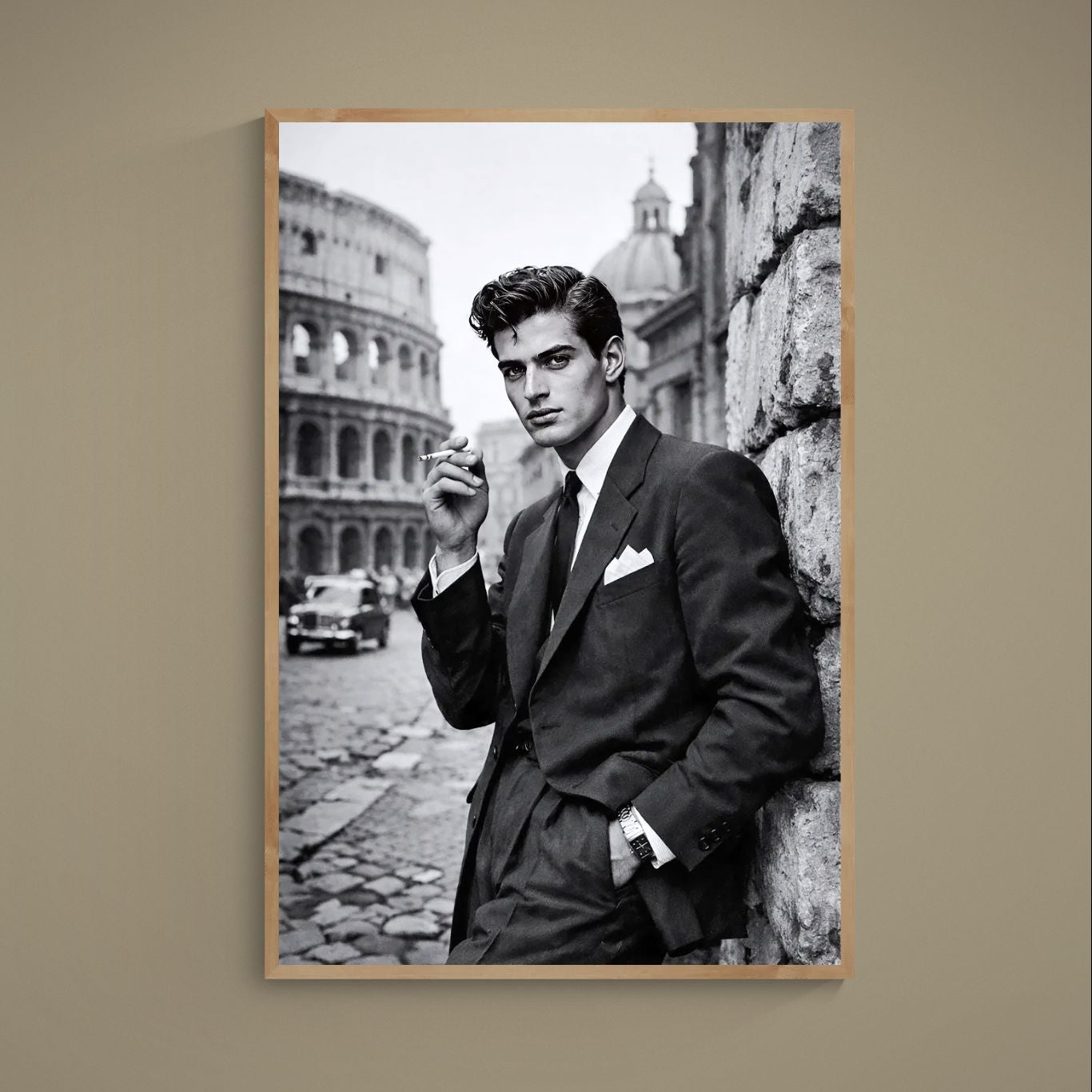 Black-and-white poster of suited man with cigarette before the Colosseum in a wood frame mockup