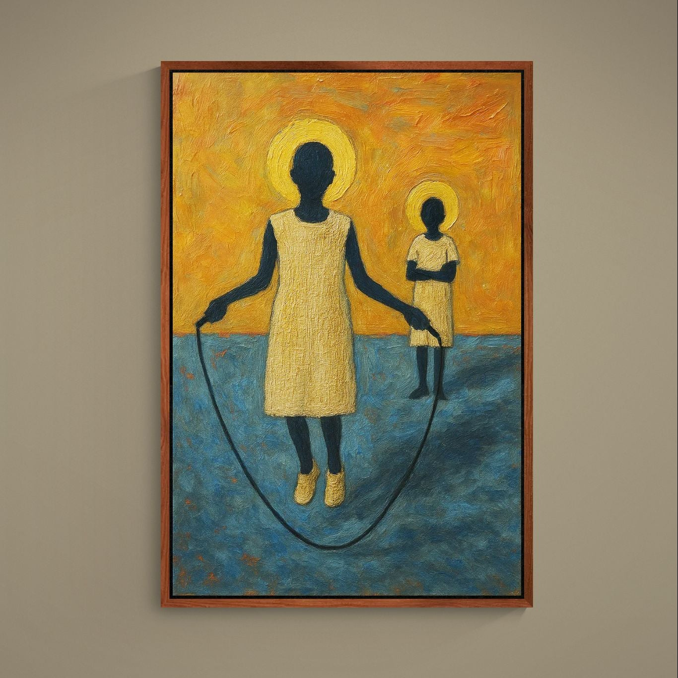 Framed canvas of two silhouetted children skipping rope with gold halos on orange and blue abstract background