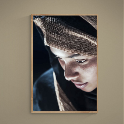 Close-up photorealistic portrait with beige headscarf on black background, printed as matte paper wall art