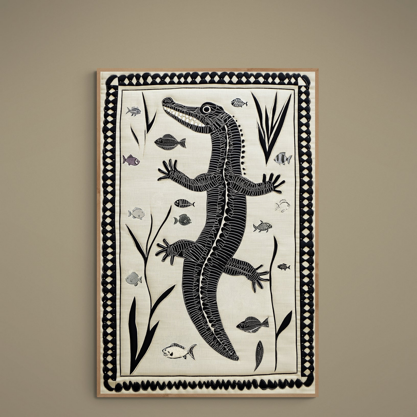 Black quilt-style crocodile poster on cream ground with fish, aquatic plants and decorative lattice border
