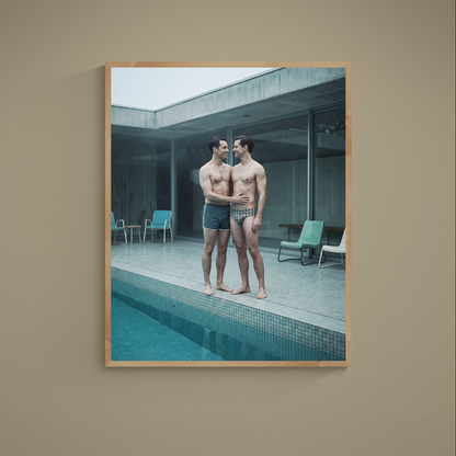 Two shirtless figures embracing by a turquoise pool beside modern concrete and glass architecture