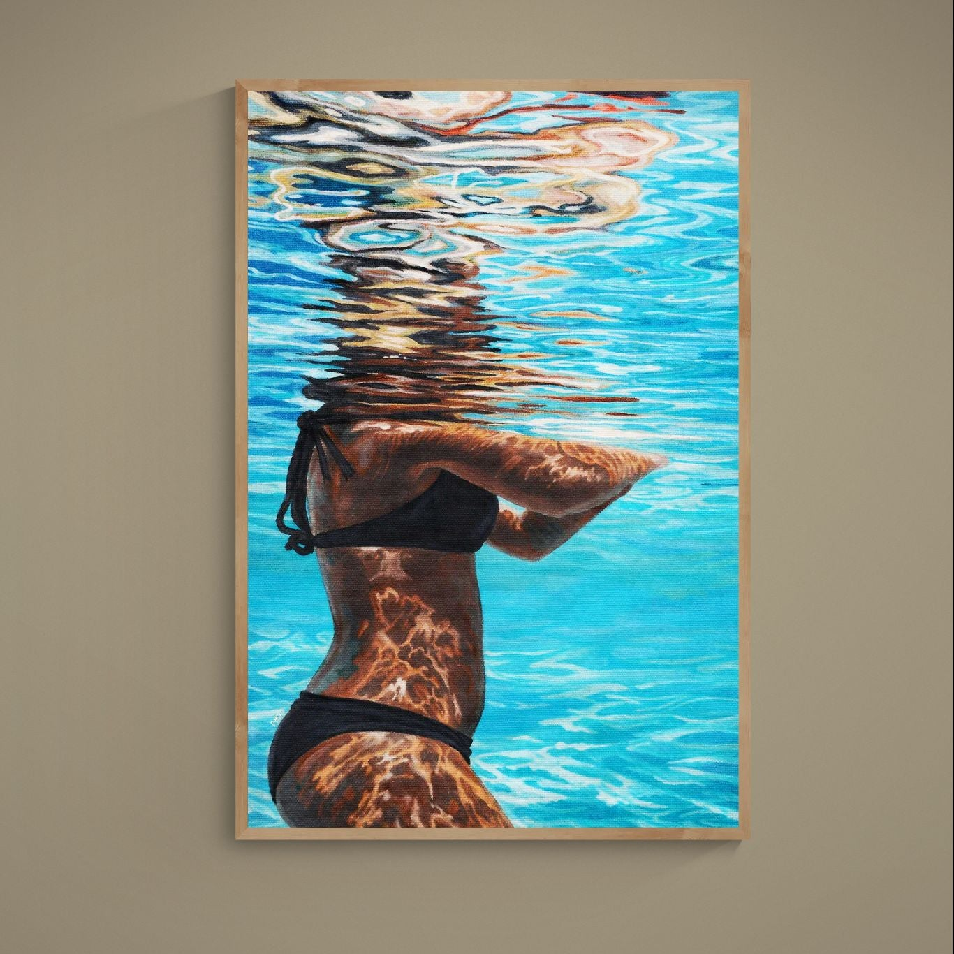 Abstract realist poster of a woman partly submerged in blue turquoise water with sunlight reflections