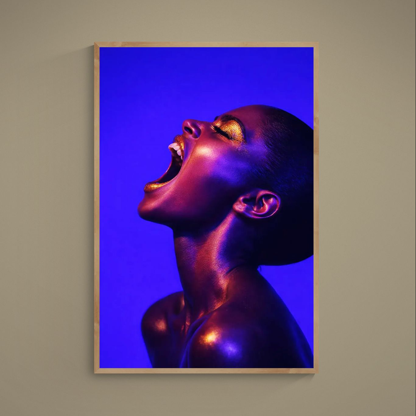 Close-up editorial portrait with gold makeup on deep blue background, matte poster print