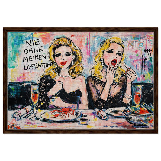 Never Without Lipstick framed canvas with two women dining, bold pop-art colors, German quote, dark wood frame